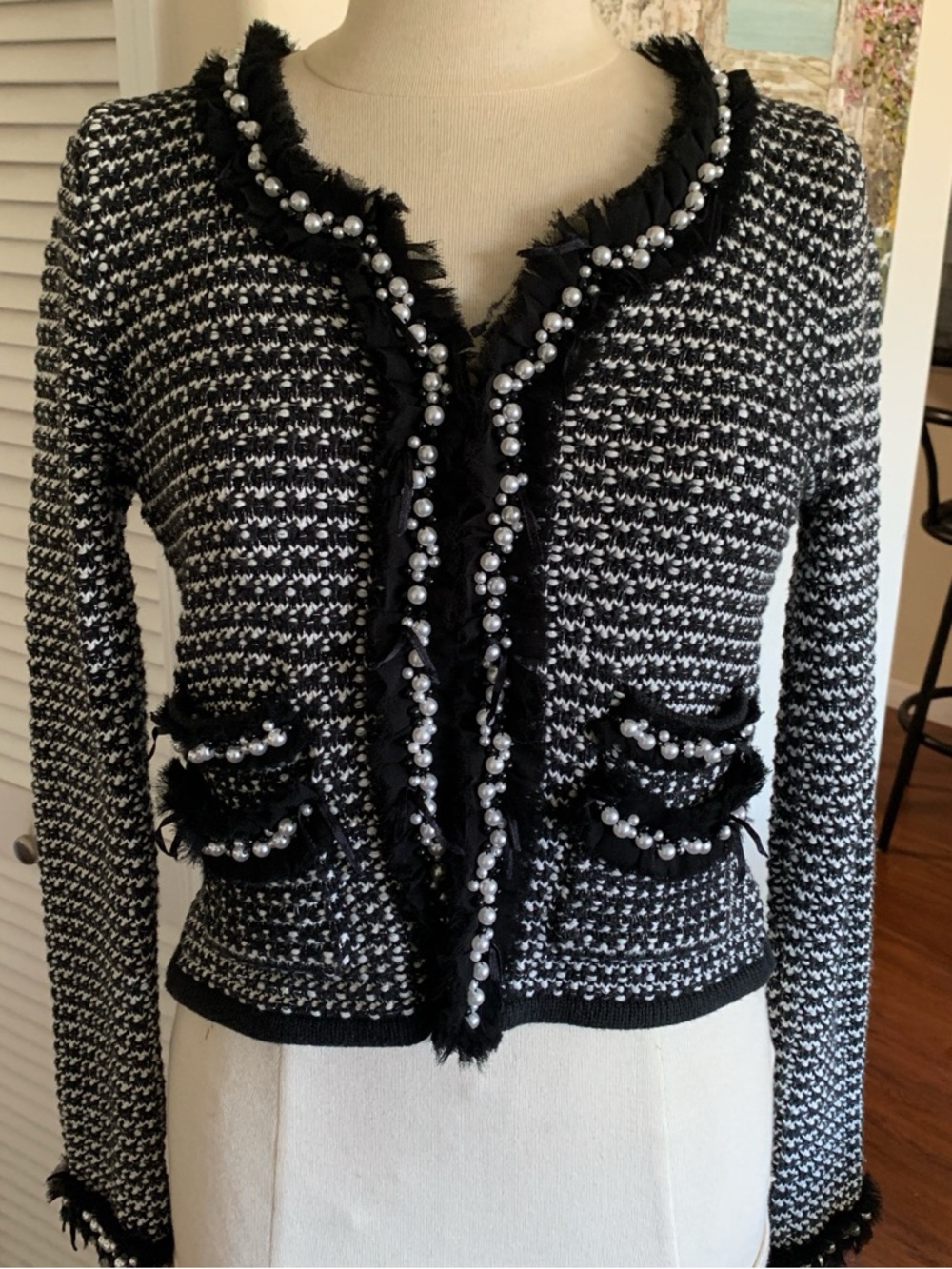 White House Black Market black and white tweed jacket adorned with pretty pearls